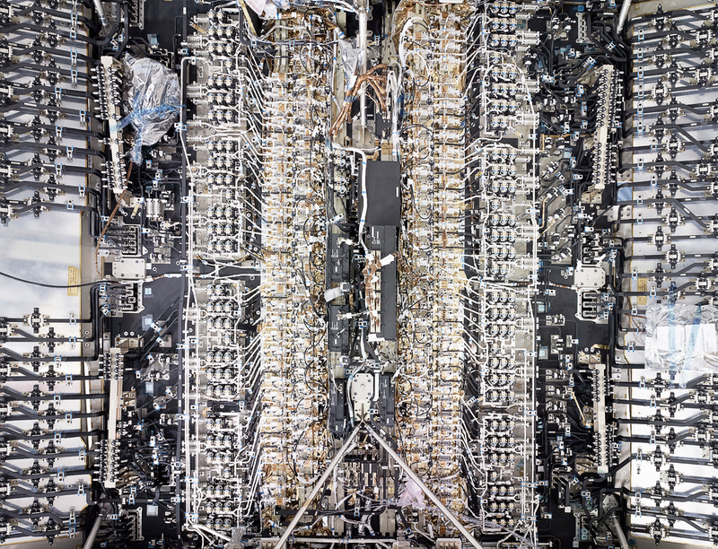 Illustration for article titled The interior of a communications satellite is a cable nightmare